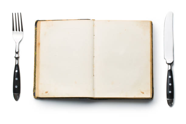 istock vintage book and cutlery 908263094