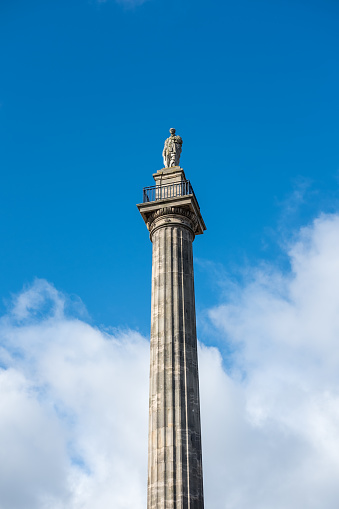 Grey's Monument, the monument to Charles Grey, 2nd Earl Grey in the city centre of Newcastle upon Tyne, England. against the blue sky