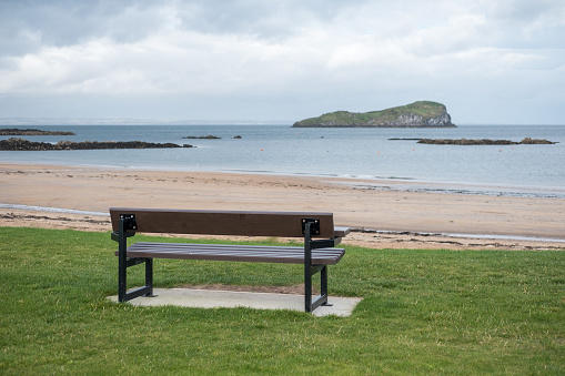 A bench, next to the seaA bench, next to the sea