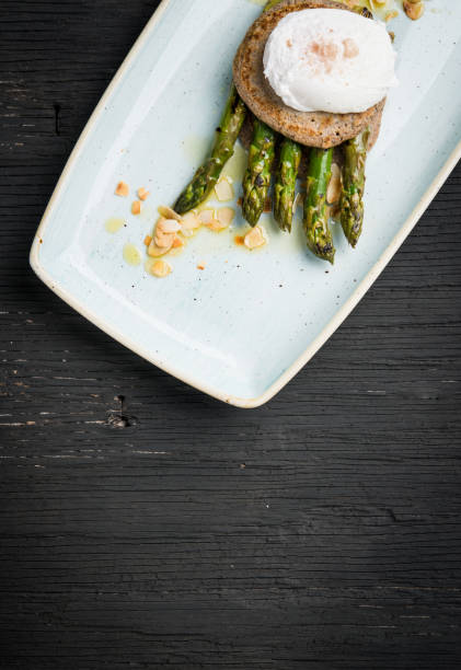 istock Vegan buckwheat pancake with asparagus over rustic wood and copy space 908278478
