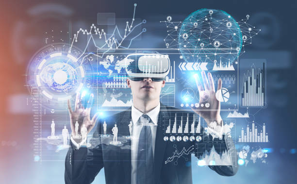 istock Businessman in VR glasses, infographics, HUD 908281438