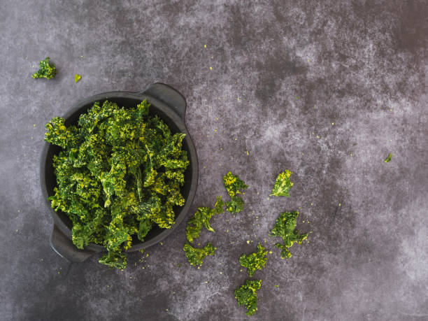 Kale chips with salt in a bowl