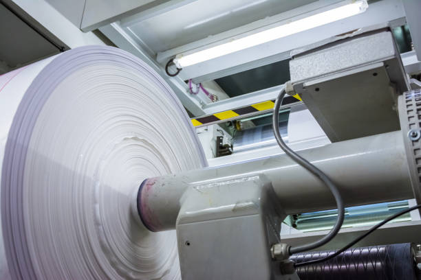 istock Flexography Roll Material Printed Sheets Cylinder Production Industrial Magenta Rollers Printer Industry Commercial Heavy Flourescent Lights Machine 908289402
