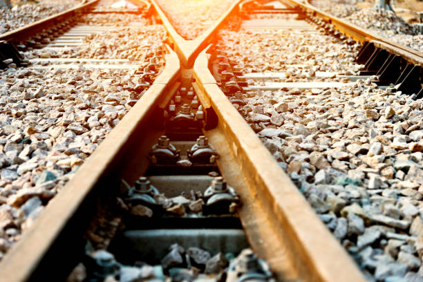 istock Closeup of train line crossing 908290056