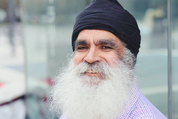 istock Portrait of smiling Sikh man 908293834