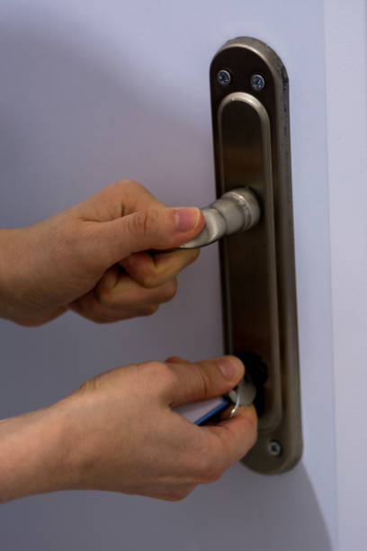 istock Woman locking the door 908304360