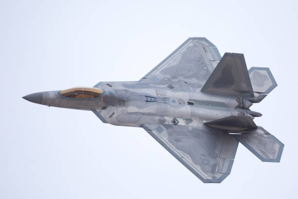 istock F-22 Raptor in a very close view, with afterburners on 908304646