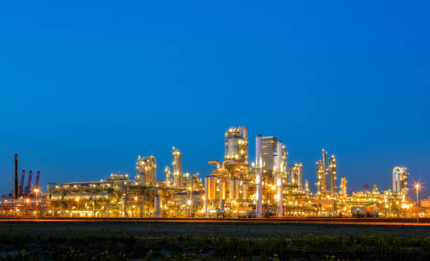 istock Oil and gas industry, refinery at dusk 908304906
