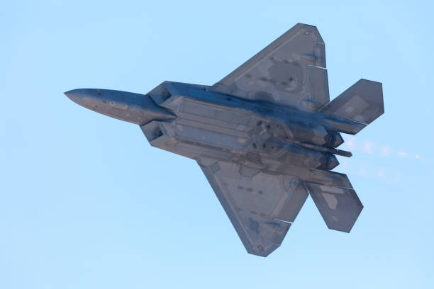 istock F-22 Raptor in a very close view, with afterburners on 908305860