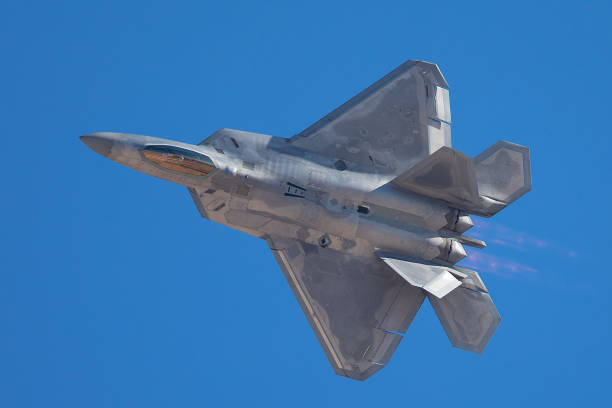 istock F-22 Raptor in a very close view, with afterburners on 908306760