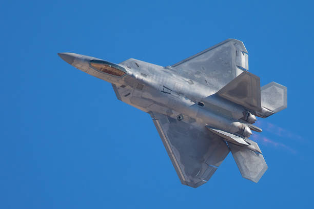 istock F-22 Raptor in a very close view, with afterburners on 908306802