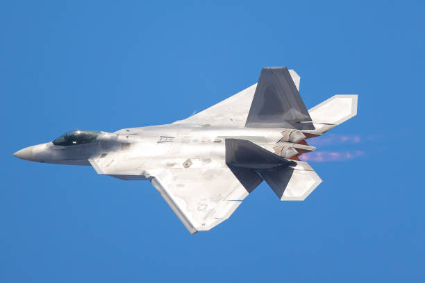 istock F-22 Raptor in a very close view, with afterburners on 908307022