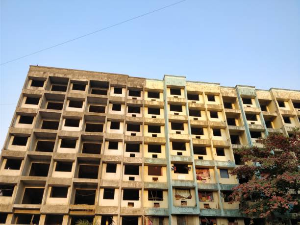 istock Old obsolete industrial building ruined 908307700