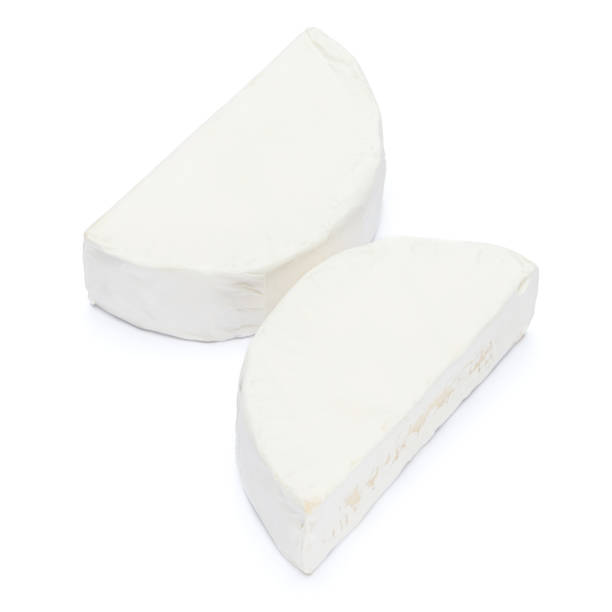 istock Piece of brie or camambert cheese on a white background 908310132
