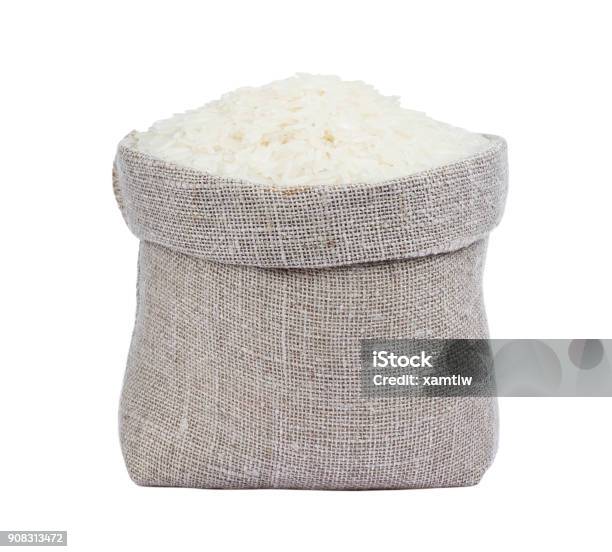 Jasmine Rice In Bag Isolated On White Background Stock Photo - Download Image Now - Asian Food, Bag, Basmati Rice