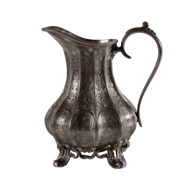 istock Vintage antique jug isolated on white background 908317756