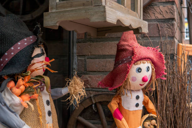 istock Close up of straw dolls scarecrow 908321146