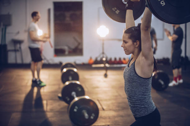 istock Girl training in gym 908324182
