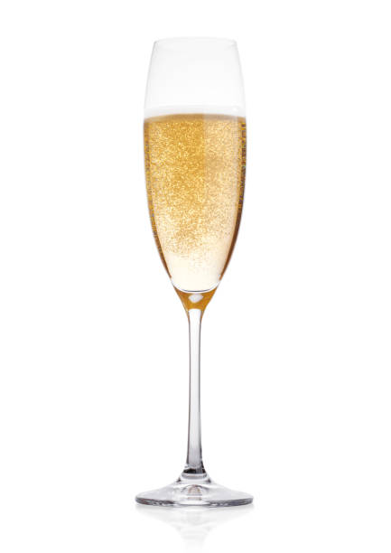 istock Elegant glass of yellow champagne with bubbles 908324270