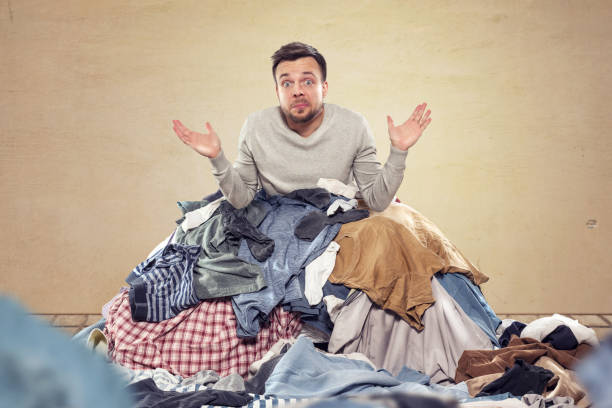 istock Man overstrained with housekeeping 908330166