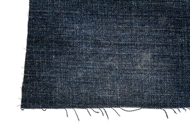 istock Piece of dark jeans fabric 908336694