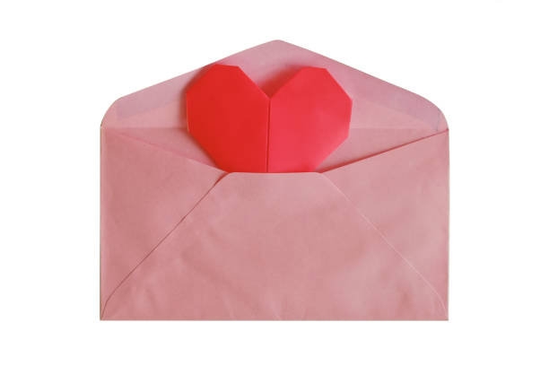 istock Pink envelope with red heart paper origami isolated on white background 908343598