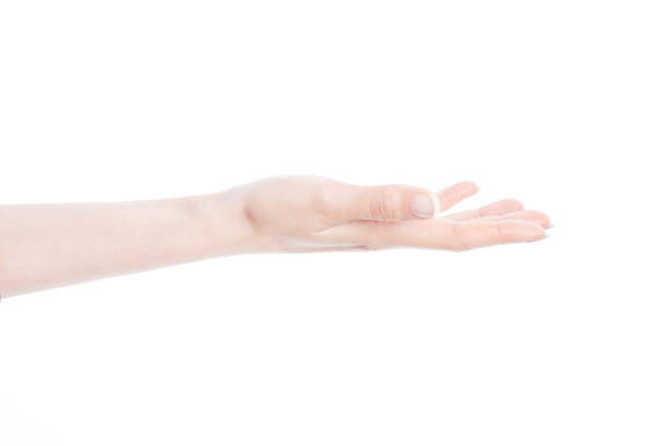 istock Close-up of beautiful woman's hand. Palm up 908344916