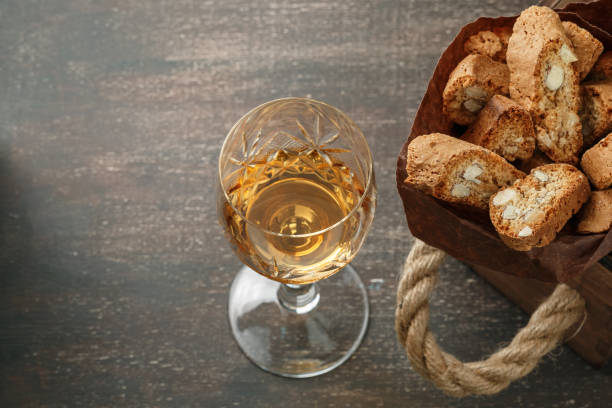istock Italian cantucci biscuits and a glass of wine 908345064