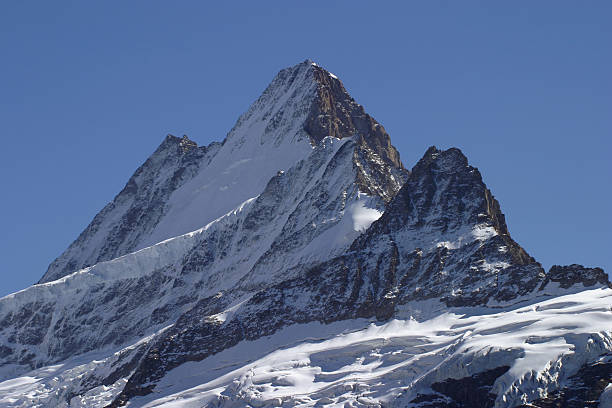 山のピーク - switzerland european alps schreckhorn horizontal ストックフォトと画像