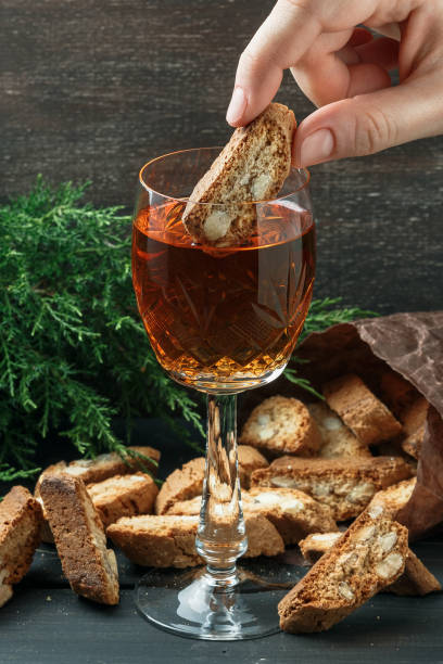 istock Italian cantuccini biscuits and a glass of wine 908347574