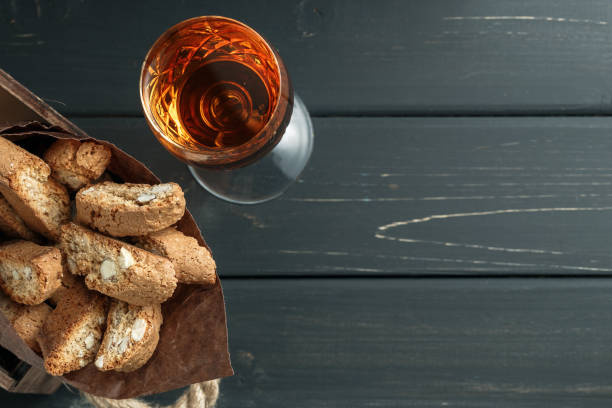 istock Italian cantucci biscuits and a glass of wine 908350262