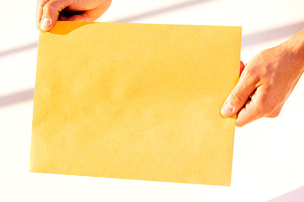 Holding Envelope stock photo