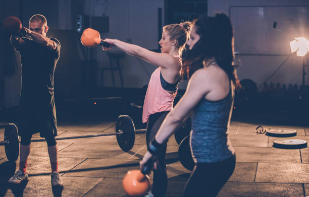 istock Girls weightlifting 908352730
