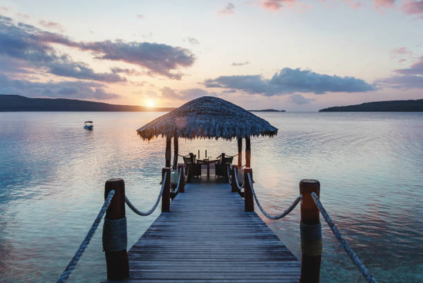 istock Romantic Sunset Beach Jetty Efate Island Coast Vanuatu Islands 908370040
