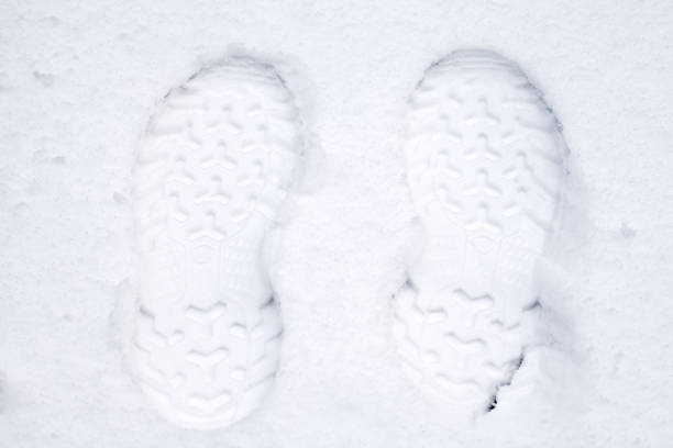 istock Male footprint in the snow 908370232