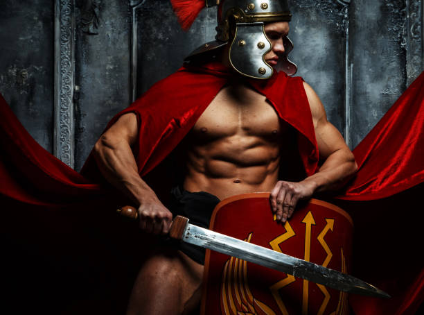 istock Roman warrior with muscular body 908376152