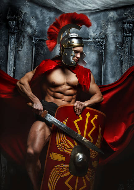 istock Roman warrior with muscular body 908376258