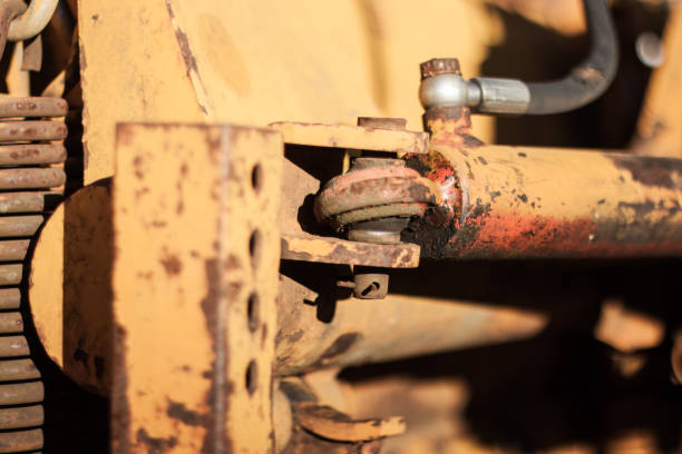 istock Old and rusted machinery in sun light 908382340
