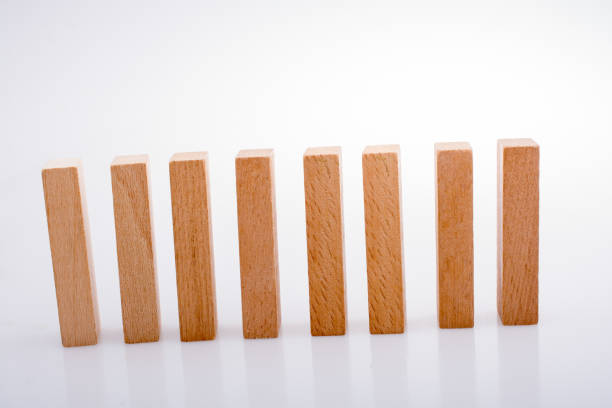 istock Wooden domino blocks on white background 908385806