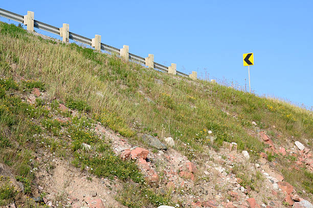 istock Highway Embankment With Caution Sign 90838618