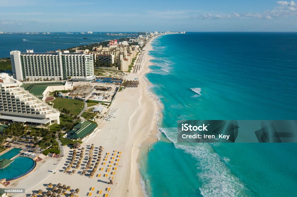 Cancun beach panorama aerial view. Aerial view of Caribbean Sea beach. Zona hotelera top view. Beauty nature landscape with tropical beach. Caribbean seaside beach with turquoise water and big wave Aerial view of Caribbean Sea beach. Top view aerial video of beauty nature landscape with a tropical beach. Cancun, Mexico, Cancun Stock Photo