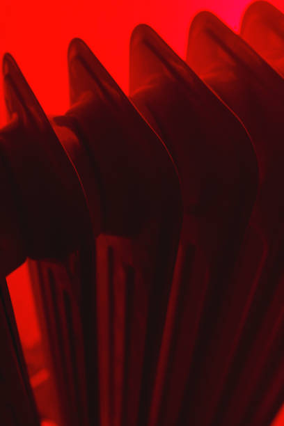 istock Oily electric heater in red light 908389568