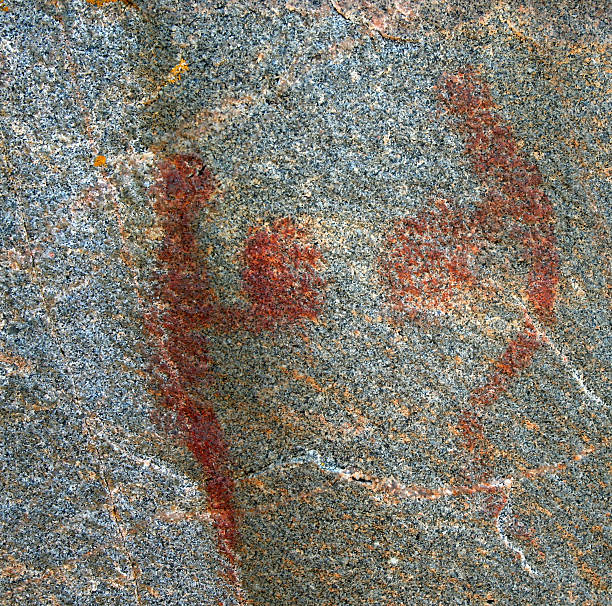 Rock art paintings on the walls of Pomongwe Cave in the Matobo National Park in Zimbabwe. Formerly known as Matobo Hills it is Zimbabwe's oldest national park and a UNESCO World Heritage Site.