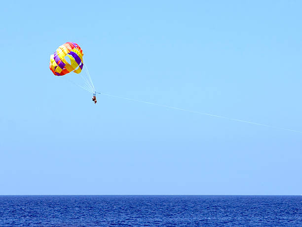 istock Parasailing on Pacific ocean Big Island Hawaii 90840321
