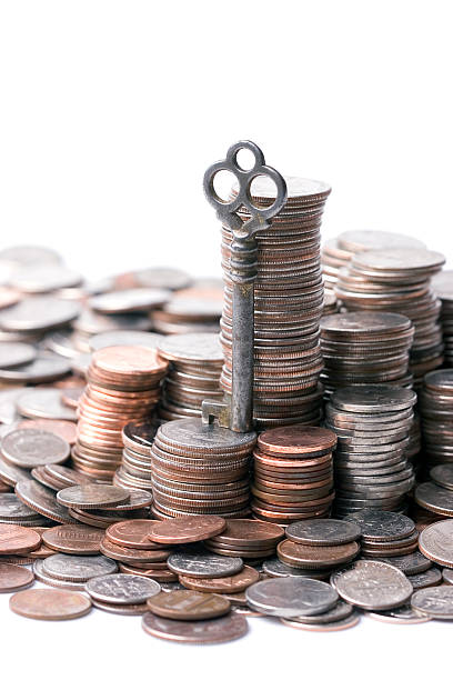 キーの経済成長 - coin stacking nickel penny ストックフォトと画像