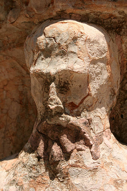 Stone face stock photo