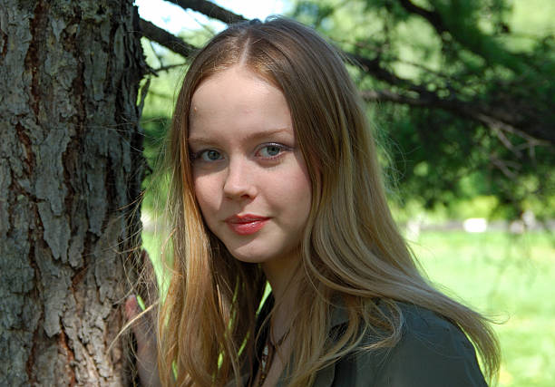 istock Beautiful girl in park 90841964
