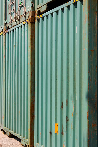 green shipping containers stock photo