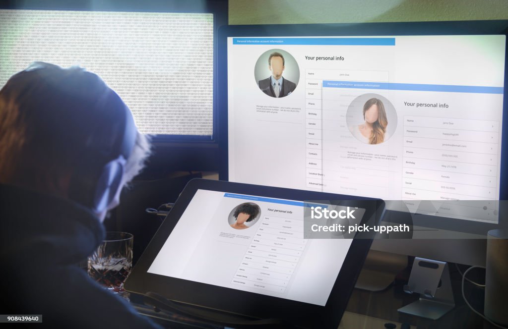 Hacker stealing your identity Stealing - Crime Stock Photo