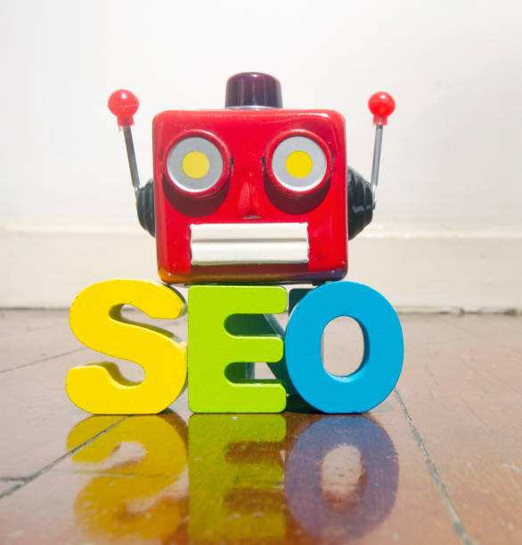 istock red retro robot head on the word   SEO 908450164